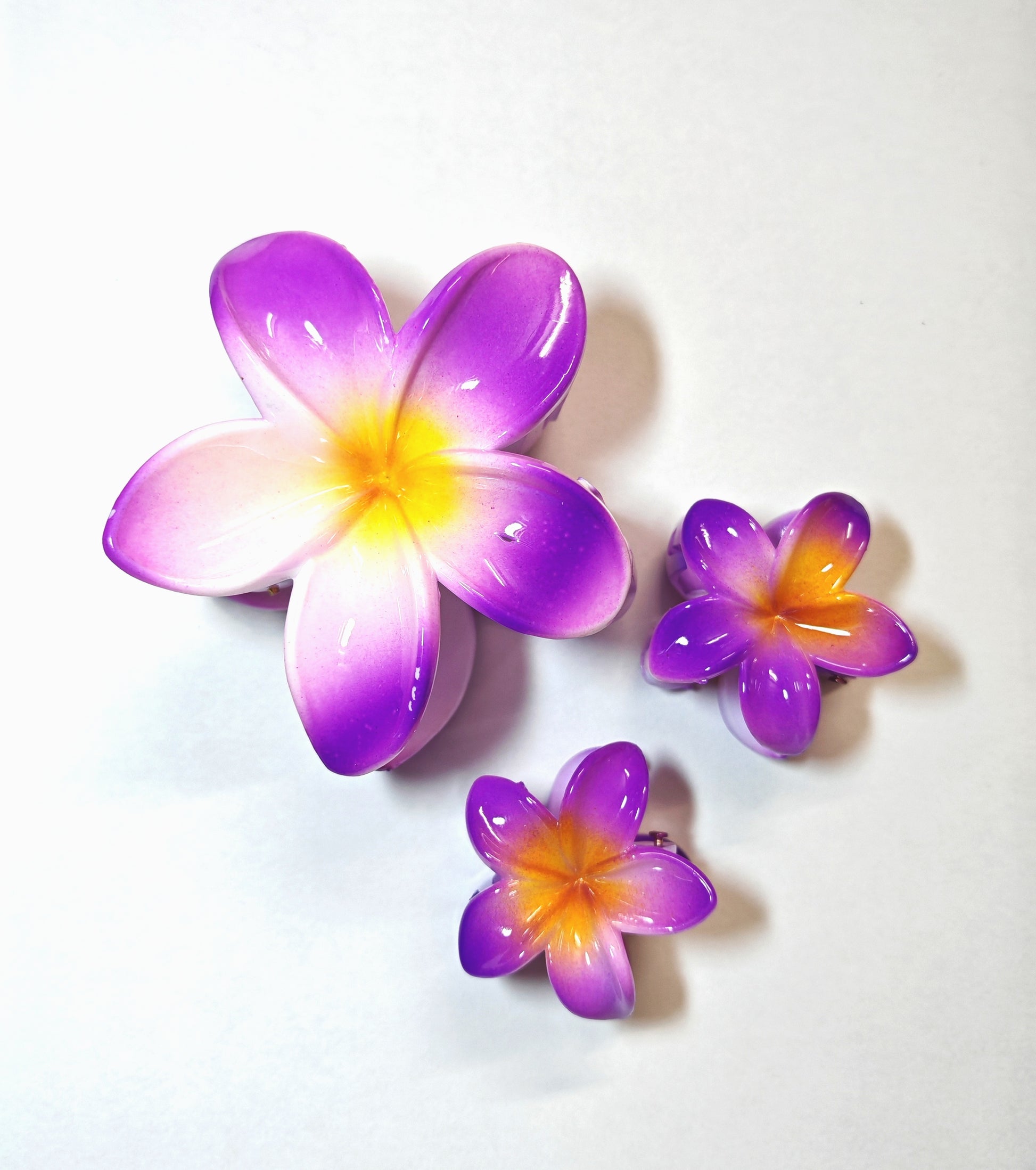 Three purple and yellow flower-shaped hair clips korean