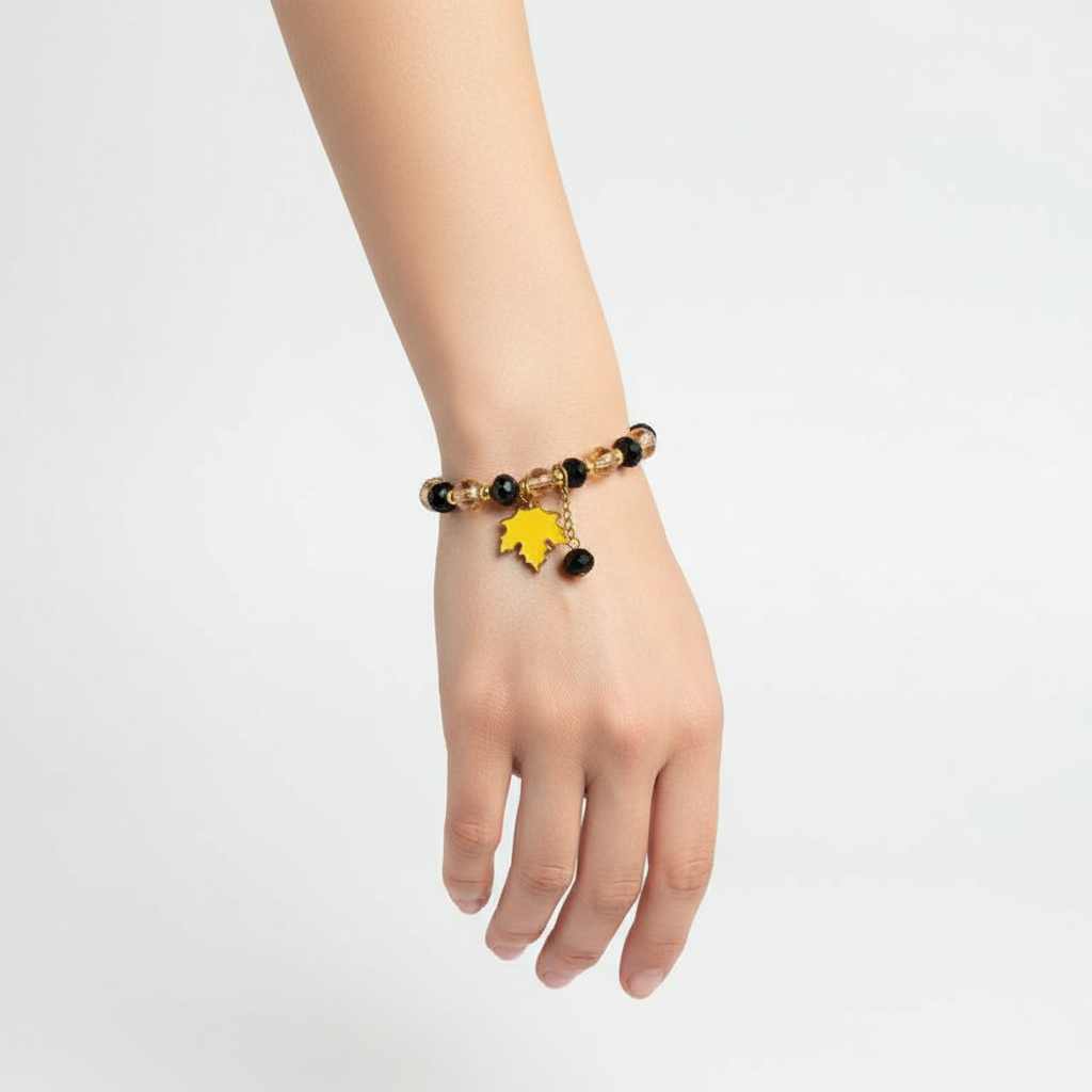 Hanging Bracelet with Black & Golden Glass Beads in hand